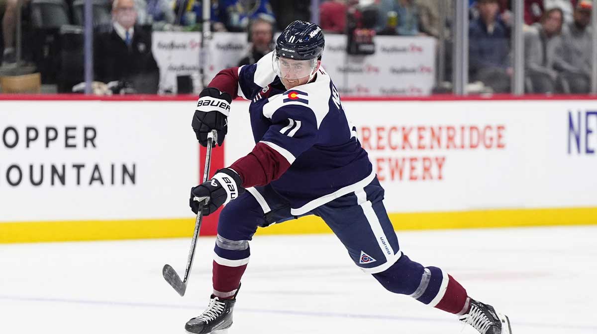 Colorado Avalanche center Brock Nelson (11) shoots the puck in the second period against the St. Louis Blues at Ball Arena