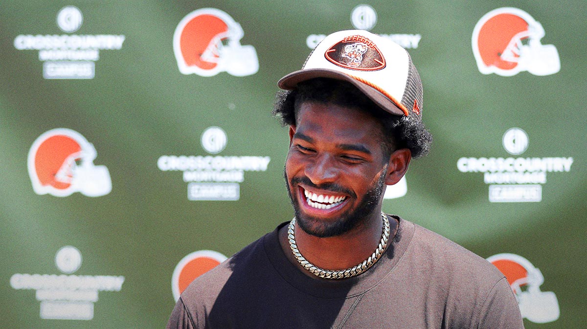 Cleveland Browns quarterback Shedeur Sanders (12) jokes about his signing bonus during a press conference before day two of NFL rookie minicamp