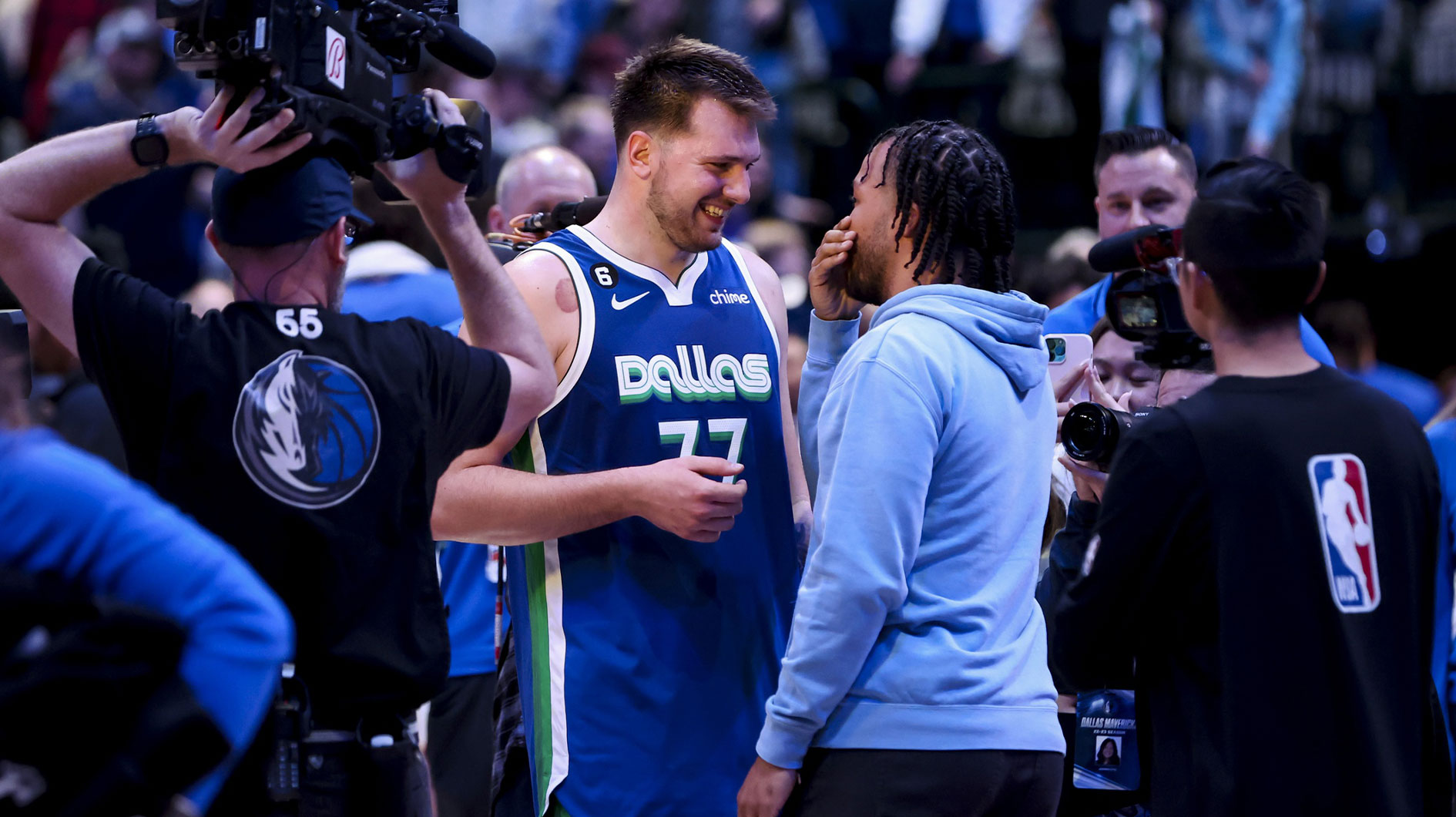 Dallas Mavericks guard Luka Doncic (77) speaks with New York Knicks guard Jalen Brunson (11) after the game at American Airlines Center.