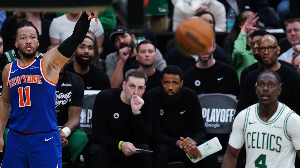 New York Knicks guard Jalen Brunson (11) makes the three point basket against the Boston Celtics in the fourth quarter during game one of the second round for the 2025 NBA Playoffs at TD Garden.