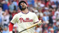 Philadelphia Phillies first base Bryce Harper (3) reacts after hitting a flying out to center during the tenth inning against the Arizona Diamondbacks at Citizens Bank Park.