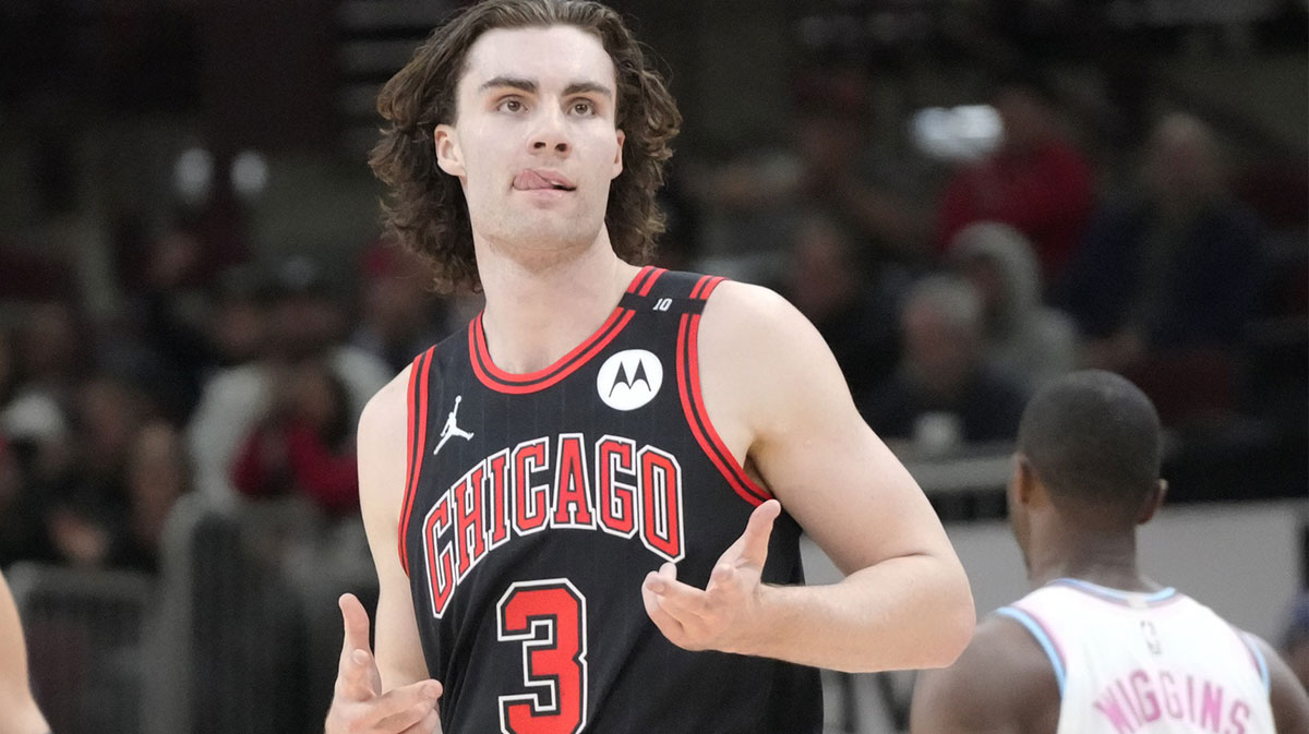 Chicago Bulls guard Josh Giddey (3) gestures after making a three point basket against the Miami Heat during the second half at United Center.