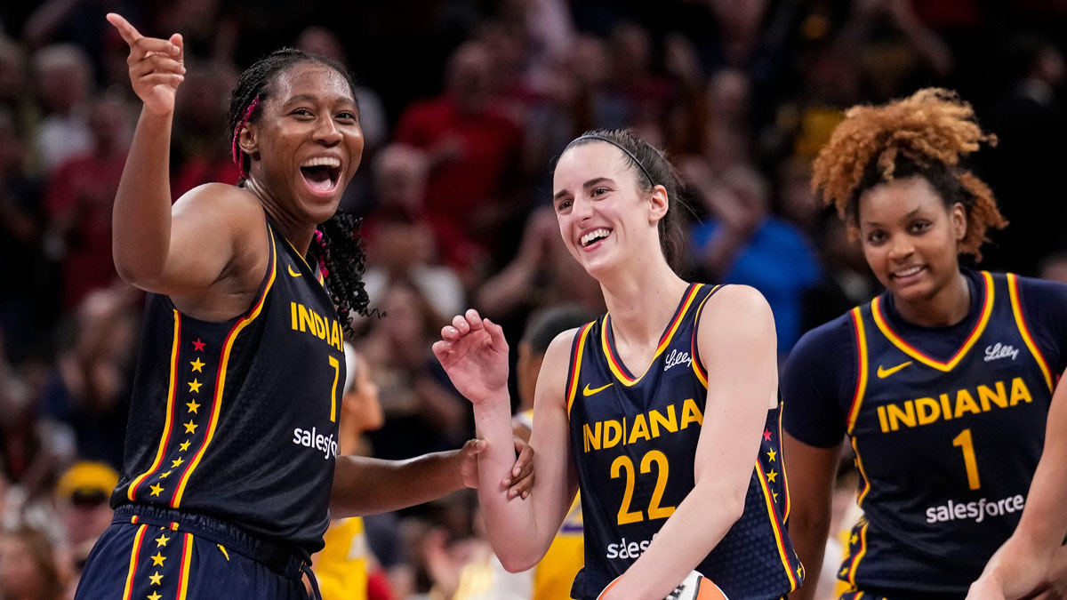 Indiana Fever forward Aliyah Boston (7) celebrates with Indiana Fever guard Caitlin Clark (22) altering recording a triple-double Wednesday, Sept. 4, 2024, during the game at Gainbridge Fieldhouse in Indianapolis. The Indiana Fever defeated the Los Angeles Sparks, 93-86.