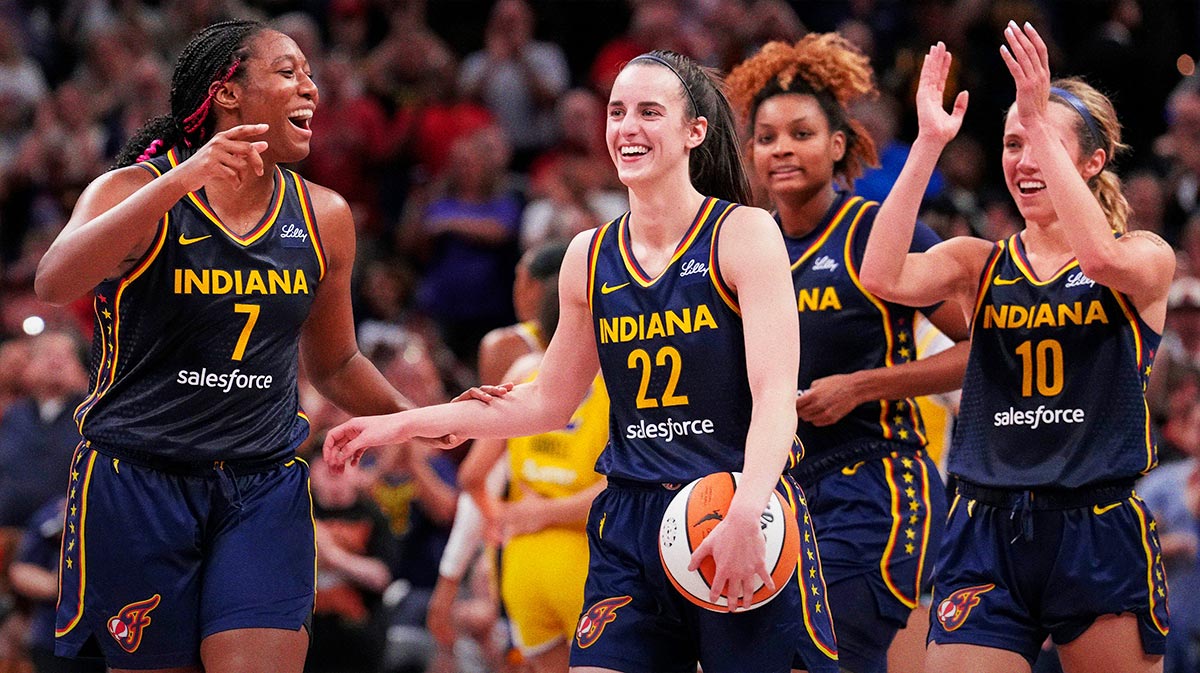Indiana Fever forward Aliyah Boston (7) celebrates with Indiana Fever guard Caitlin Clark (22) altering recording a triple-double Wednesday, Sept. 4, 2024, during the game at Gainbridge Fieldhouse in Indianapolis. The Indiana Fever defeated the Los Angeles Sparks, 93-86.