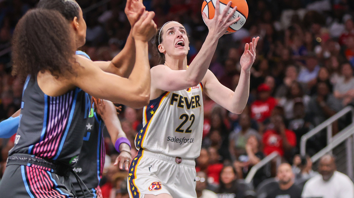 Indiana Fever guard Caitlin Clark (22) shoots against the Atlanta Dream in the fourth quarter at State Farm Arena.