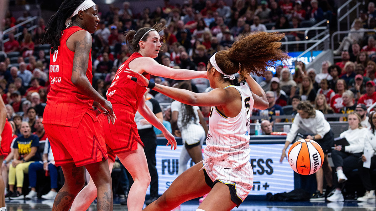 Indiana Fever guard Caitlin Clark (22) fouls Chicago Sky forward Angel Reese (5) in the second half at Gainbridge Fieldhouse.