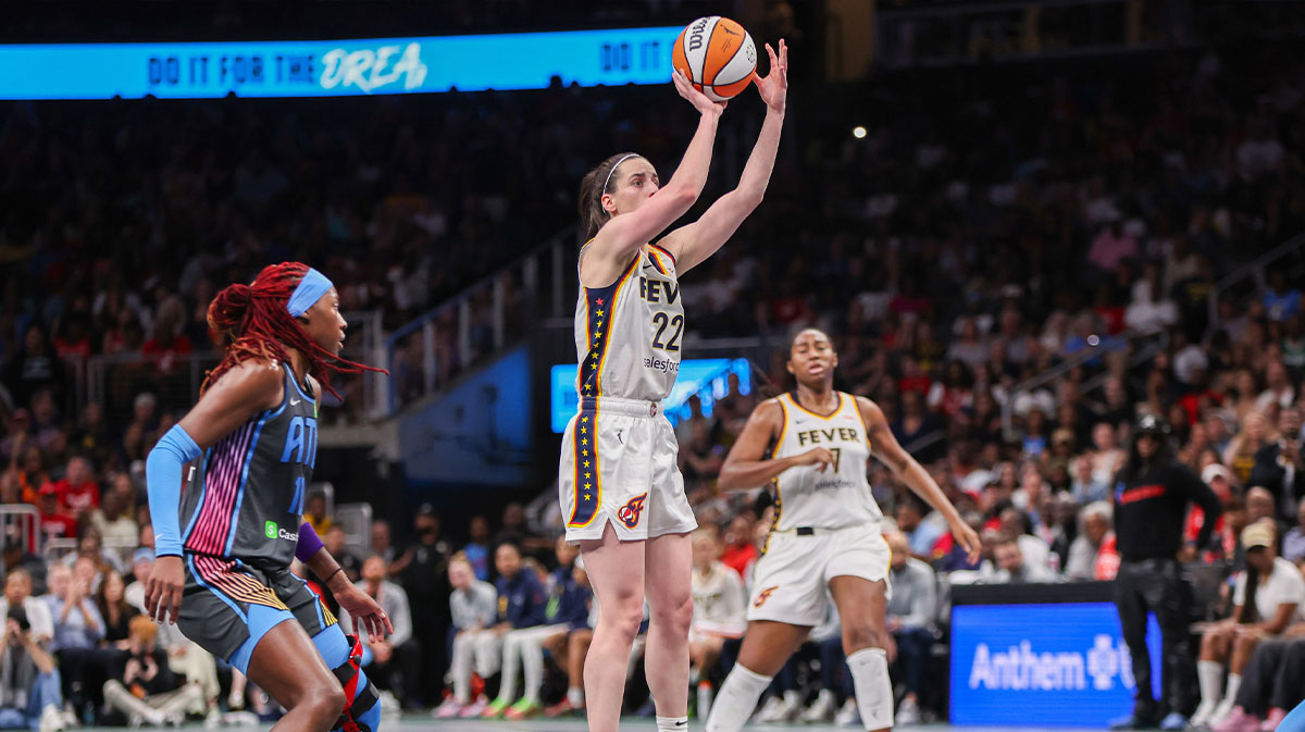 Indiana Fever guard Caitlin Clark (22) shoots against the Atlanta Dream in the fourth quarter at State Farm Arena.