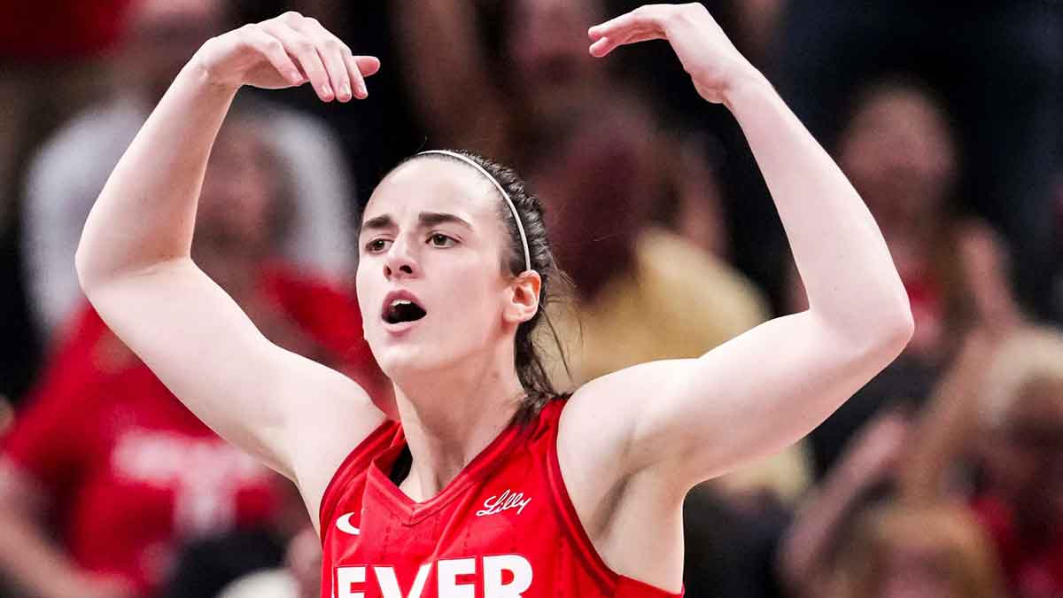 Indiana Fever guard Caitlin Clark (22) gets the crowd excited Saturday, May 17, 2025, during a game between the Indiana Fever and the Chicago Sky at Gainbridge Fieldhouse in Indianapolis. The Indiana Fever defeated the Chicago Sky, 93-58.