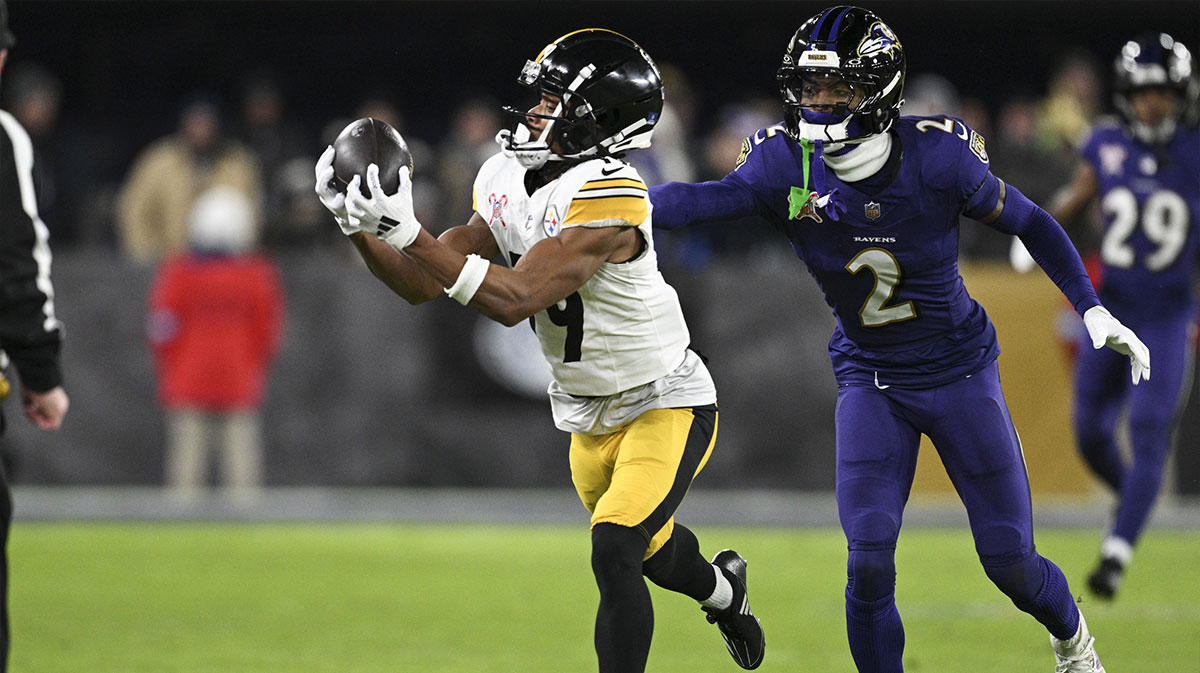 Dec 21, 2024; Baltimore, Maryland, USA; Pittsburgh Steelers wide receiver Calvin Austin III (19) catches a pass along the sideline in front of Baltimore Ravens cornerback Nate Wiggins (2) during the second half at M&T Bank Stadium.