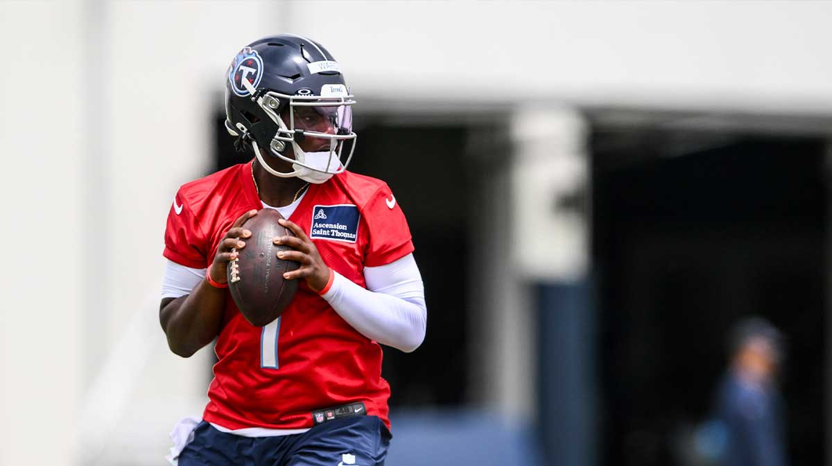 May 10, 2025; Nashville, TN, USA; Tennessee Titans quarterback Cam Ward (1) goes through throwing drills during Rookie Mini Camp at Saint Thomas Sports Park. Mandatory Credit: Steve Roberts-Imagn Images