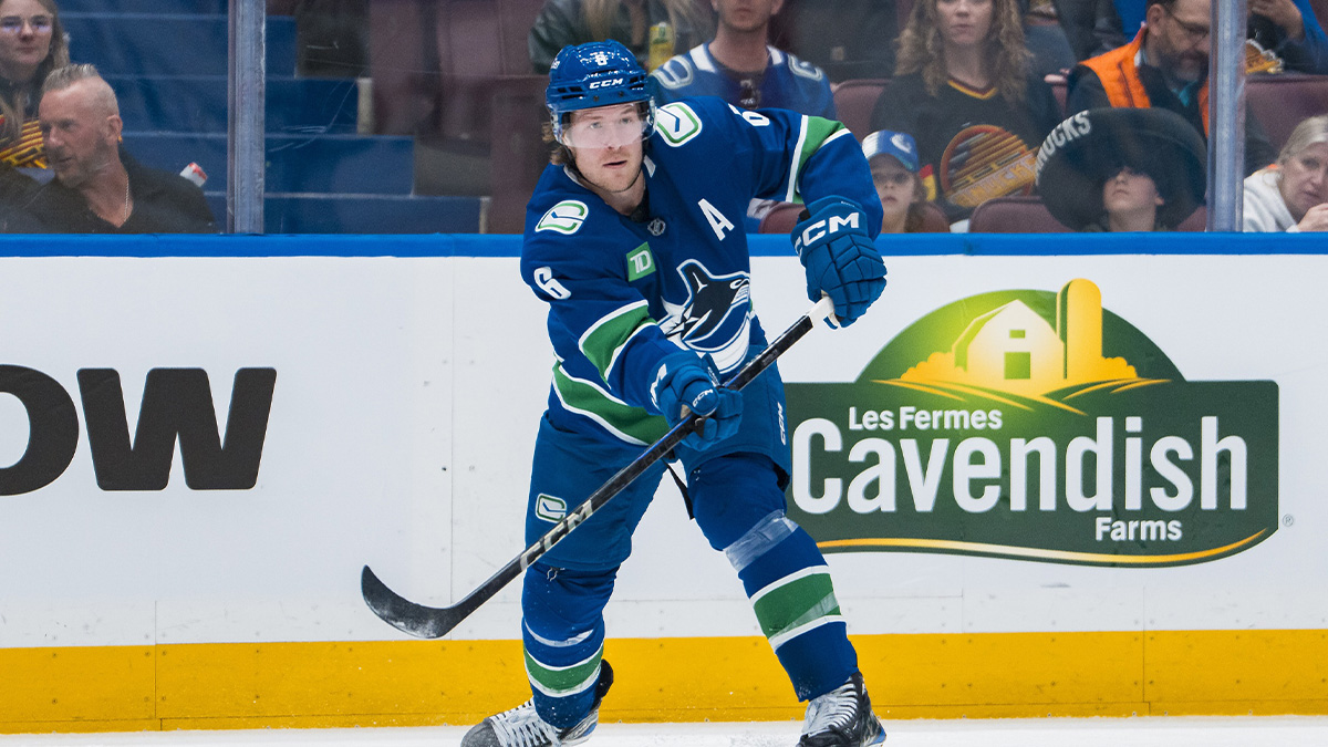 Vancouver Canucks forward Brock Boeser (6) makes a pass against the Minnesota Wild in the second period at Rogers Arena.