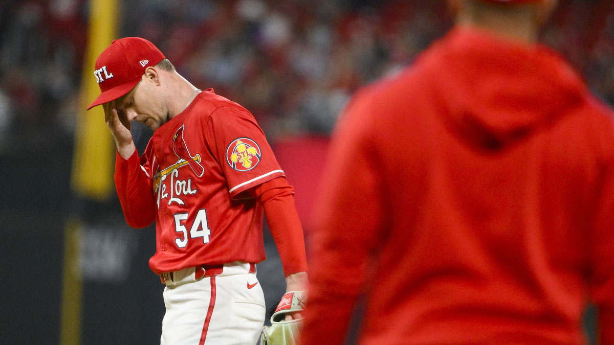 St. Louis Cardinals starting pitcher Sonny Gray (54) waits on the mound as manager Oliver Marmol (37) walks out to remove him from the game against the New York Mets during the fifth inning at Busch Stadium.
