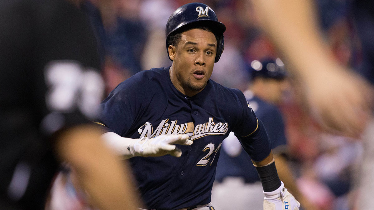 Milwaukee Brewers center fielder Carlos Gomez (27) runs home and scores during the fifth inning against the Philadelphia Phillies at Citizens Bank Park.