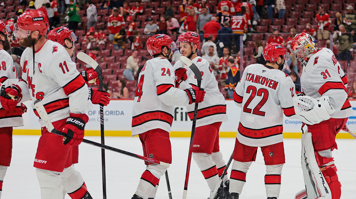 The Carolina Hurricanes celebrate after their win against Florida Panthers in game four of the Eastern Conference Final of the 2025 Stanley Cup Playoffs at Amerant Bank Arena.