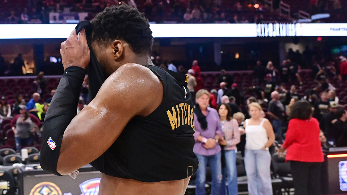 Cavs guard Donovan Mitchell (45) walks off