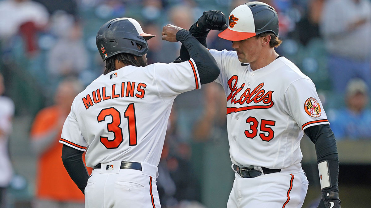 Baltimore Orioles catcher Adley Rutschman (35) greeted by outfielder Cedric Mullins (31) who scored on his two run home run in the third inning against the Tampa Bay Rays at Oriole Park at Camden Yards.