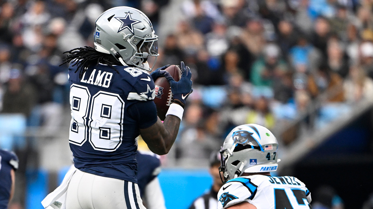 Dallas Cowboys wide receiver CeeDee Lamb (88) with the ball as Carolina Panthers linebacker Josey Jewell (47) defends in the second quarter.