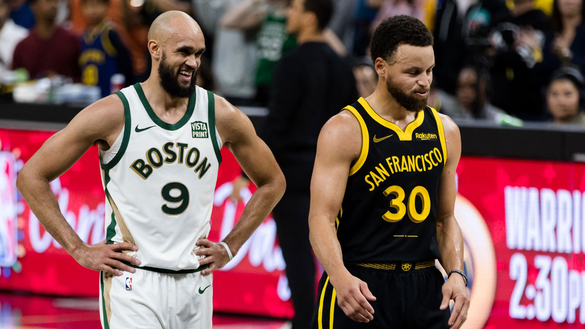 Boston Celtics guard Derrick White (9) and Golden State Warriors guard Stephen Curry (30) on the court during the overtime period at Chase Center.