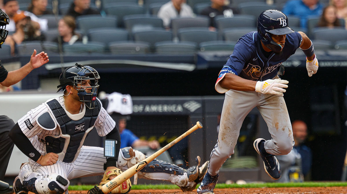 Tampa Bay Rays center fielder Chandler Simpson (14) hits an infield single during the fifth inning against the New York Yankees at Yankee Stadium.