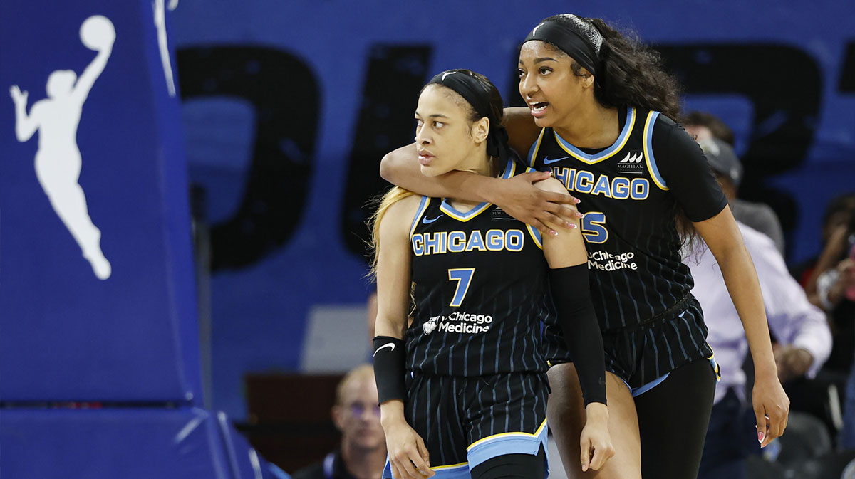 Chicago Sky guard Chennedy Carter (7) reacts next to forward Angel Reese (5) after scoring against the Las Vegas Aces during the second half at Wintrust Arena.