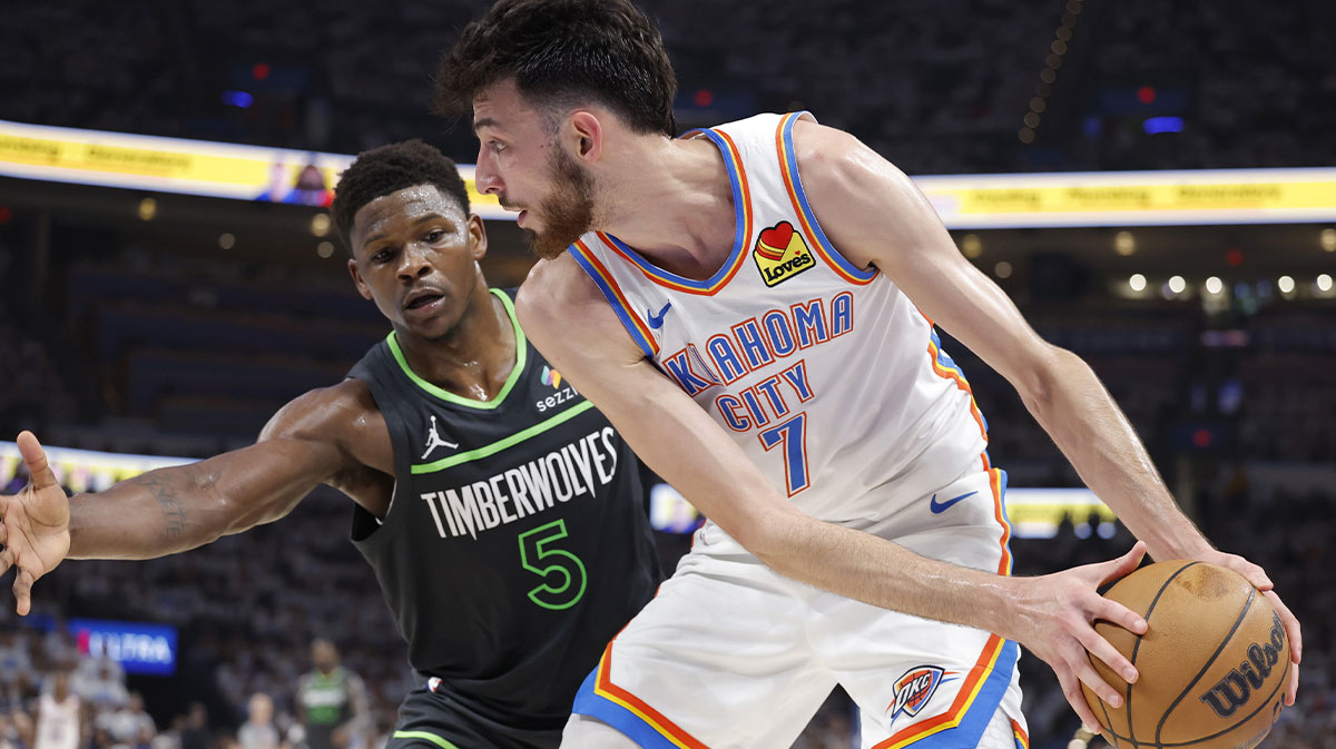 Oklahoma City Thunder forward Chet Holmgren (7) controls the ball against Minnesota Timberwolves guard Anthony Edwards (5) in the second quarter during game one of the western conference finals for the 2025 NBA Playoffs at Paycom Center.
