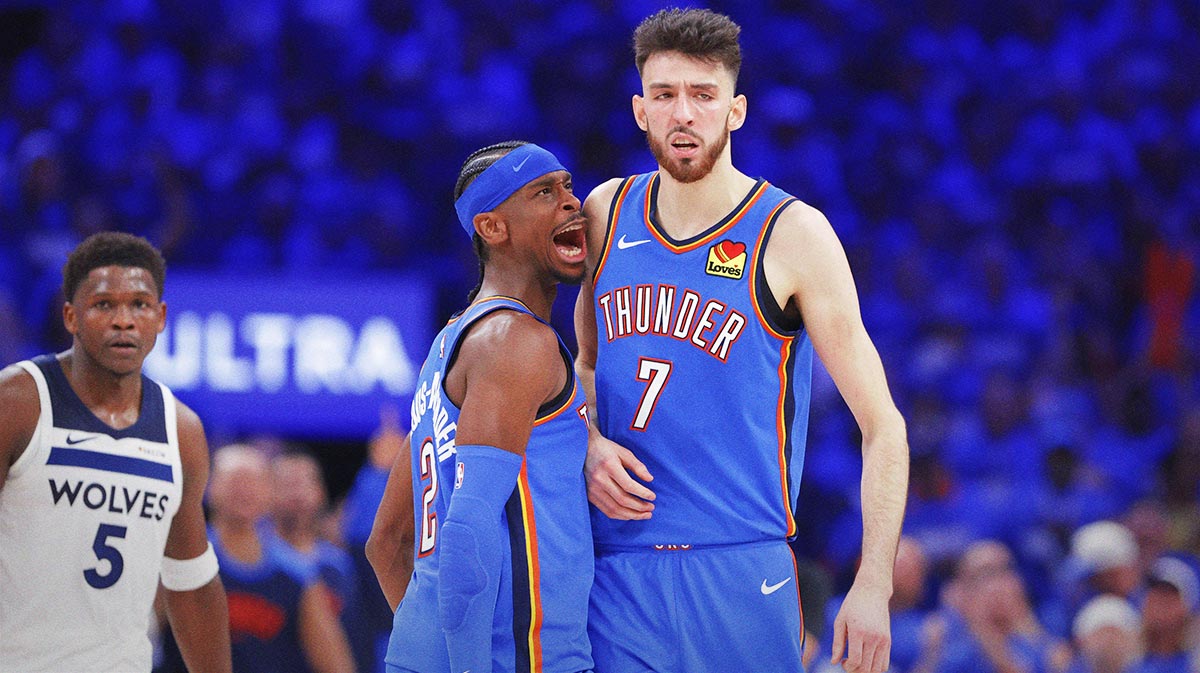 Oklahoma City Thunder guard Shai Gilgeous-Alexander (2) and forward Chet Holmgren (7) celebrate after a play against the Minnesota Timberwolves in the third quarter during game two of the western conference finals for the 2025 NBA Playoffs at Paycom Center.