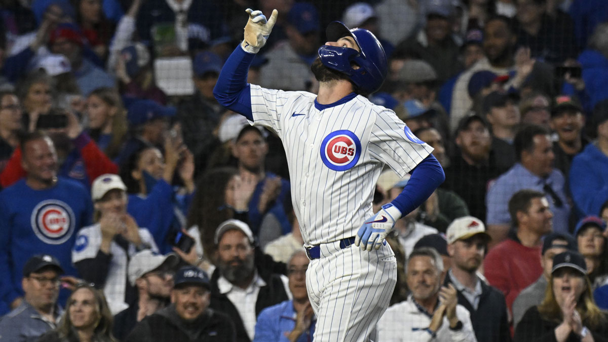 Chicago Cubs shortstop Dansby Swanson (7) points after he hit a two run home run against the Miami Marlins during the fifth inning at Wrigley Field.