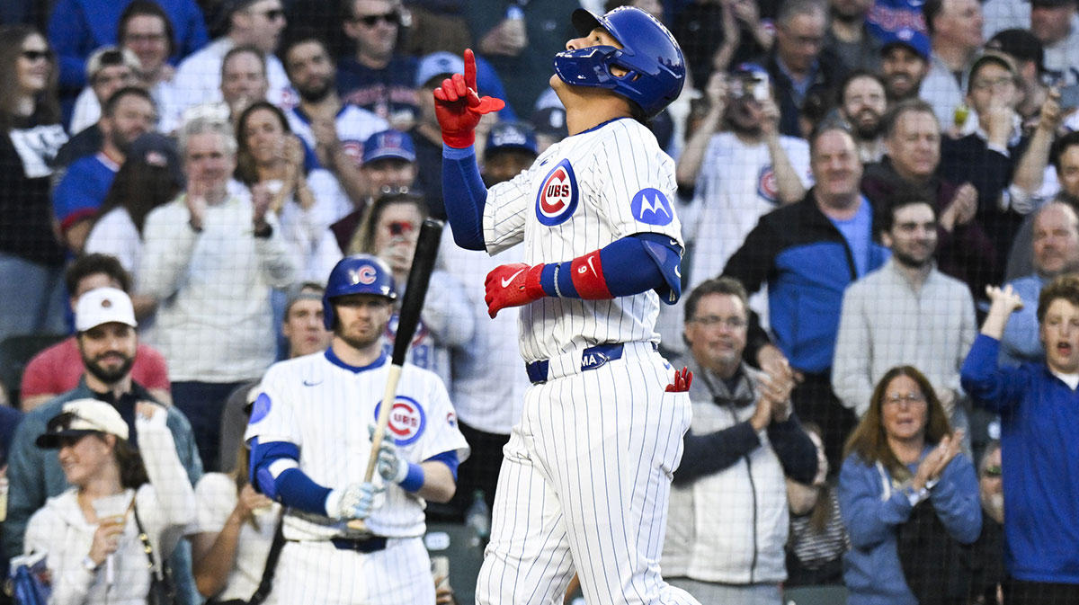 Chicago Cubs catcher Miguel Amaya (9) points after he hits a two run home run during the third inning against the San Francisco Giants at Wrigley Field.