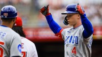 Chicago Cubs outfielder Pete Crow-Armstrong (4) reacts after hitting a two-run single in the first inning against the Cincinnati Reds at Great American Ball Park.
