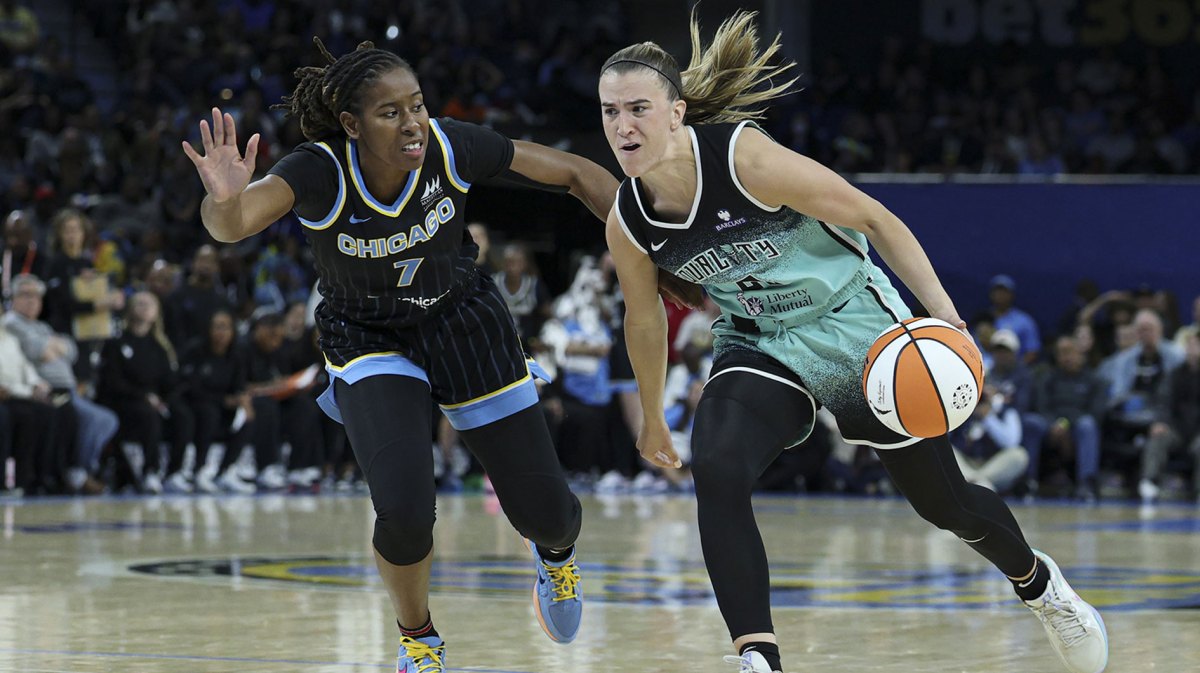 New York Liberty guard Sabrina Ionescu (20) drives to the basket against Chicago Sky guard Ariel Atkins (7) during the first half at Wintrust Arena.
