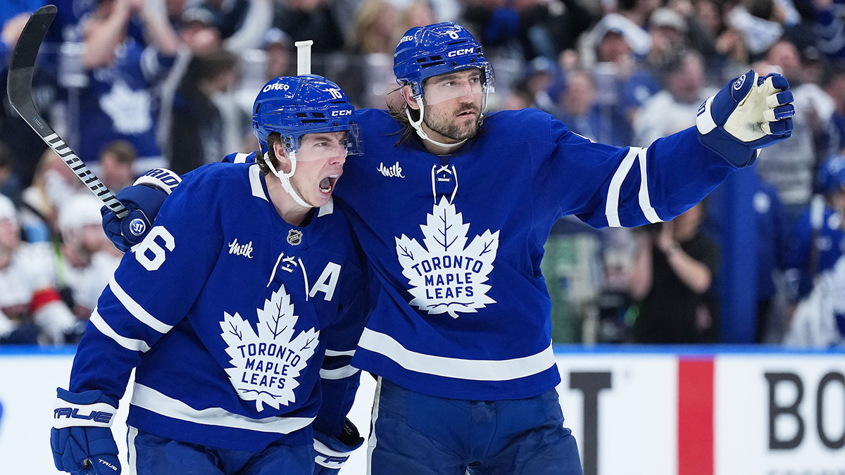 Toronto Maple Leafs right wing Mitch Marner (16) scores a goal and celebrates with defenseman Chris Tanev (8) against the Florida Panthers during the third period in game two of the second round of the 2025 Stanley Cup Playoffs at Scotiabank Arena