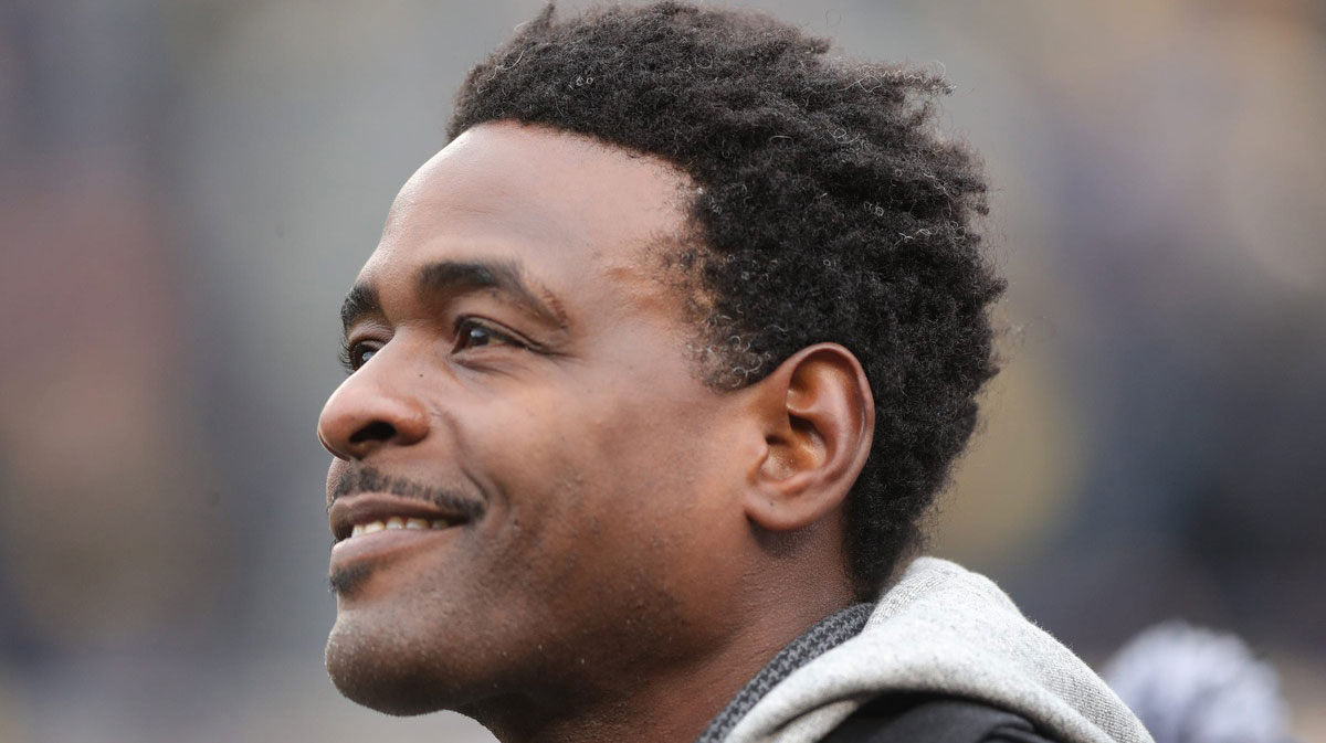 Chris Webber watches the Michigan Wolverines warm up before action against the Ohio State Buckeyes Saturday, November 30, 2019 at Michigan Stadium in Ann Arbor, Mich. Michigan Football