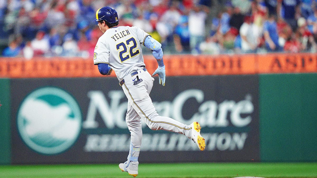Milwaukee Brewers outfielder Christian Yelich (22) rounds the bases after hitting a three-run home run against the Philadelphia Phillies in the fifth inning.