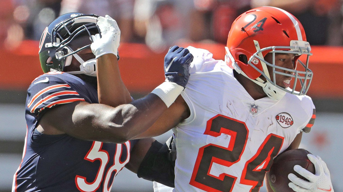 Cleveland Browns running back Nick Chubb fends off Chicago Bears Roquan Smith during a second half run on Sunday, Sept. 26, 2021 in Cleveland, Ohio, at FirstEnergy Stadium. The Browns won the game 26-6.