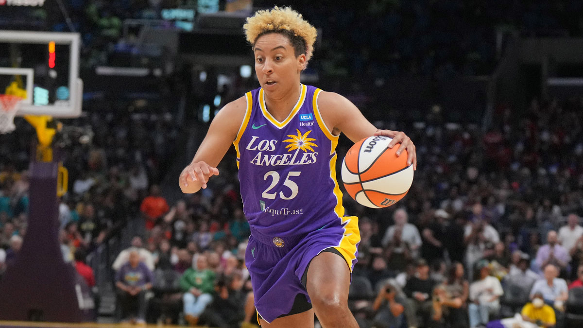 LA Sparks guard Layshia Clarendon (25) dribbles the ball in the first half against the Seattle Storm at Crypto.com Arena.