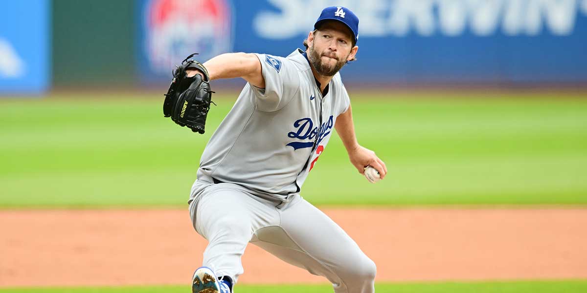 Los Angeles Dodgers starting pitcher Clayton Kershaw (22) throws a pitch during the first inning against the Cleveland Guardians at Progressive Field.