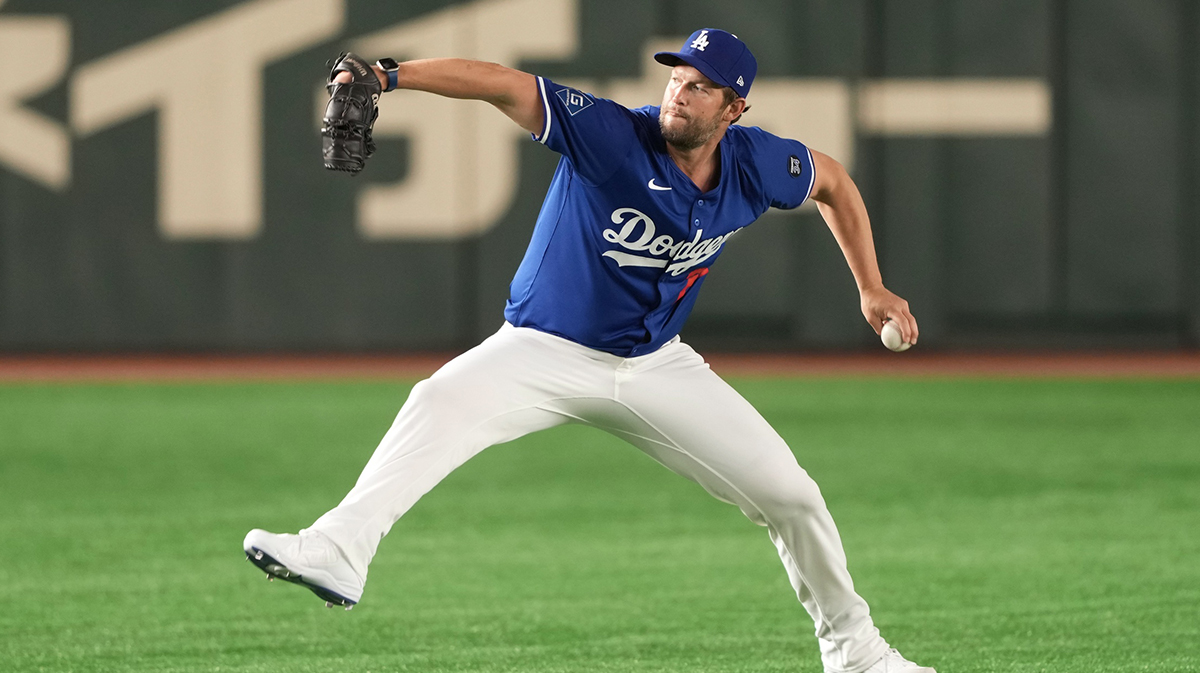 Los Angeles Dodgers pitcher Clayton Kershaw (22) warms up before the game against the Yomiuri Giants at Tokyo Dome.