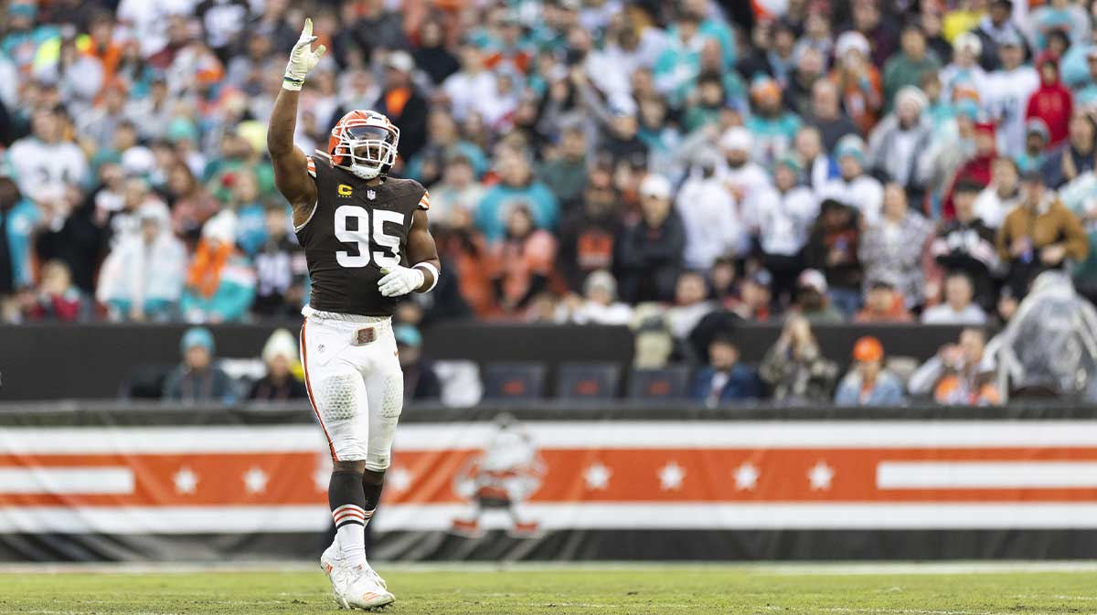 Cleveland Browns defensive end Myles Garrett (95) celebrates his sack against the Miami Dolphins during the first quarter at Huntington Bank Field.