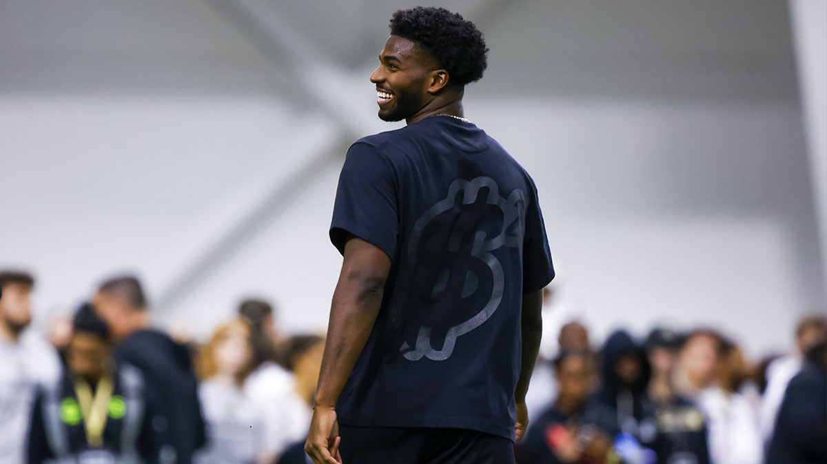 Colorado Buffaloes quarterback Shedeur Sanders (2) laughs during the University of Colorado NFL Showcase at the CU Indoor Practice Facility.