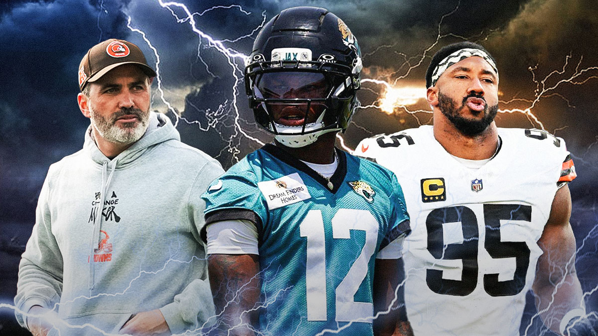 Travis Hunter in the middle, Myles Garrett and Coach Kevin Stefanski around him, Stormy skies in the background