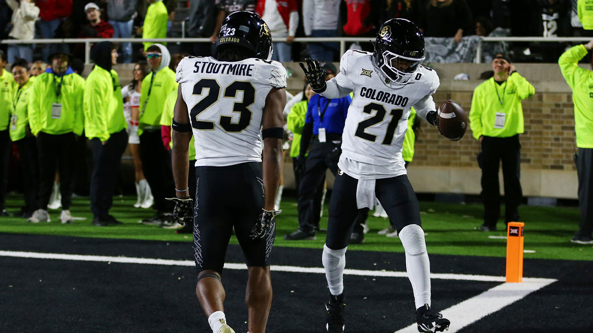 Colorado Buffalos defensive safety Shilo Sanders (21) and defensive safety Carter Stoutmire (23) celebrate scoring a touchdown against the Texas Tech Red Raiders in the second half at Jones AT&T Stadium and Cody Campbell Field.