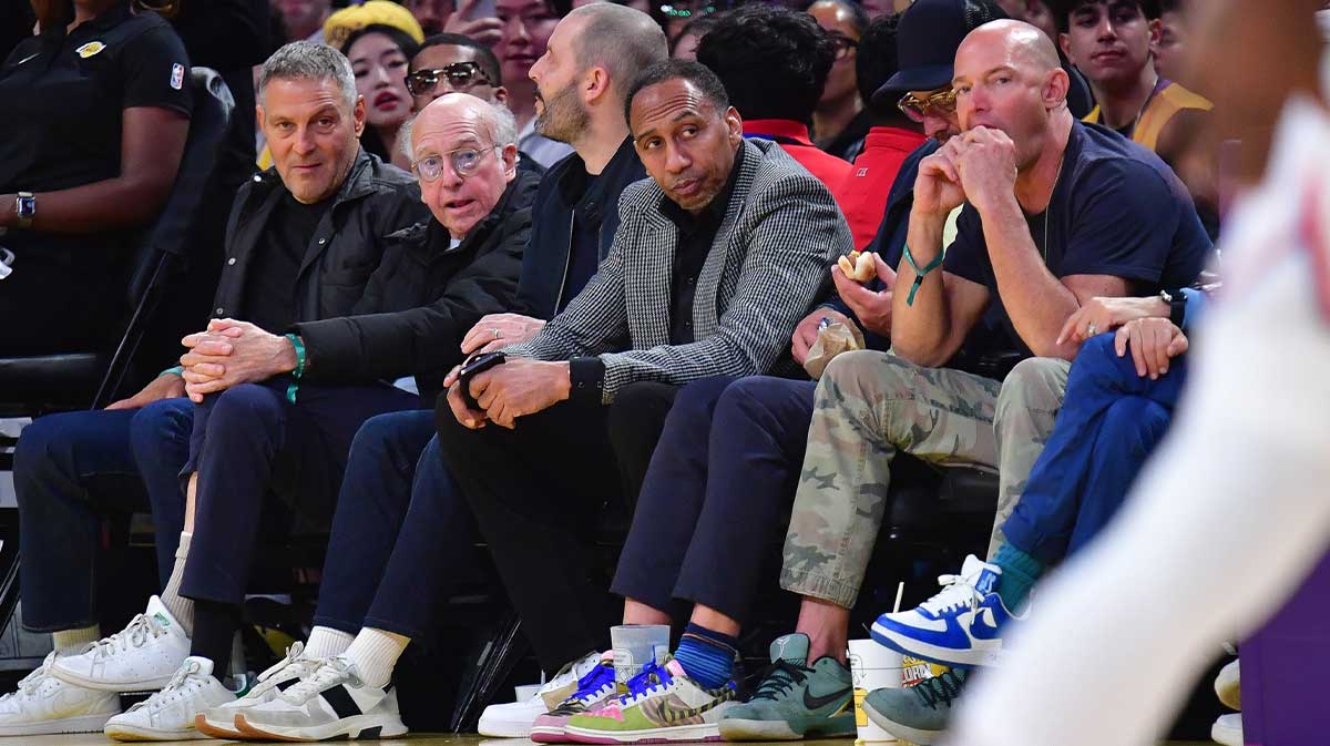 Comedian and writer Larry David and sports media personality Stephen A. Smith attend the game between the Los Angeles Lakers and New York Knicks at Crypto.com Arena.