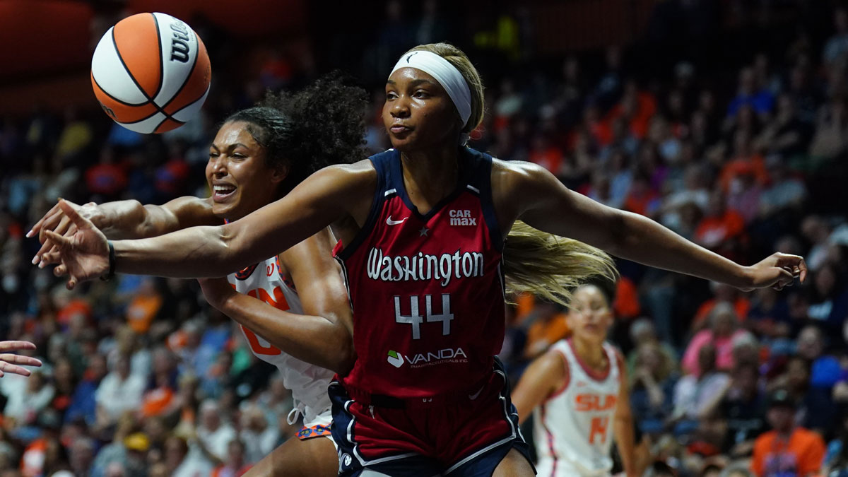 Connecticut Sun forward Olivia Nelson-Ododa (10) works for the rebound against Washington Mystics forward Kiki Iriafen (44) in the second half at Mohegan Sun Arena.