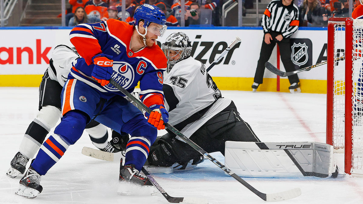 Los Angeles Kings goaltender Darcy Kuemper (35) makes a save on Edmonton Oilers forward Connor McDavid (97) during the third period in game six of the first round of the 2025 Stanley Cup Playoffs at Rogers Place