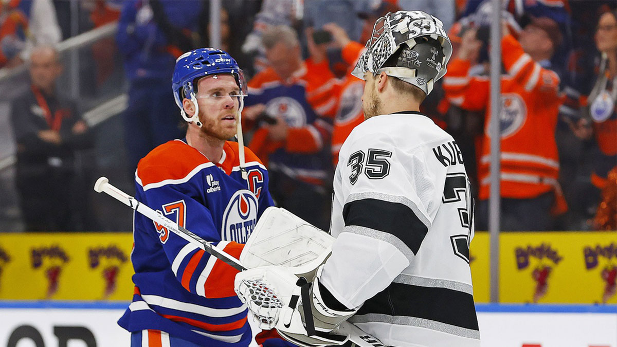 Edmonton Oilers forward Connor McDavid (97) shakes hands with Los Angeles Kings goaltender Darcy Kuemper (35) after the Oilers eliminated the Kings in game six of the first round of the 2025 Stanley Cup Playoffs at Rogers Place.
