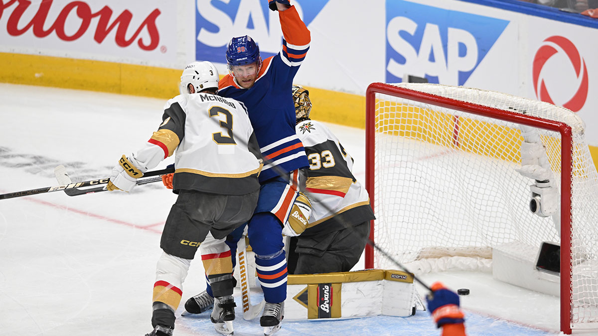 Edmonton Oilers right winger Corey Perry (90) celebrates a goal on Vegas Golden Knights goalie Adin Hill (33) in front of Knights defenceman Brayden McNabb (3) during the first period in game three of the second round of the 2025 Stanley Cup Playoffs at Rogers Place.