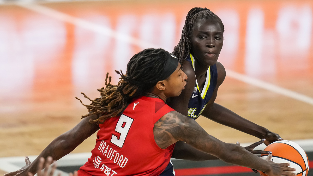 Dallas Wings center Awak Kuier (28) has the ball taken away by Atlanta Dream forward Crystal Bradford (9) during the second half at Gateway Center Arena at College Park.