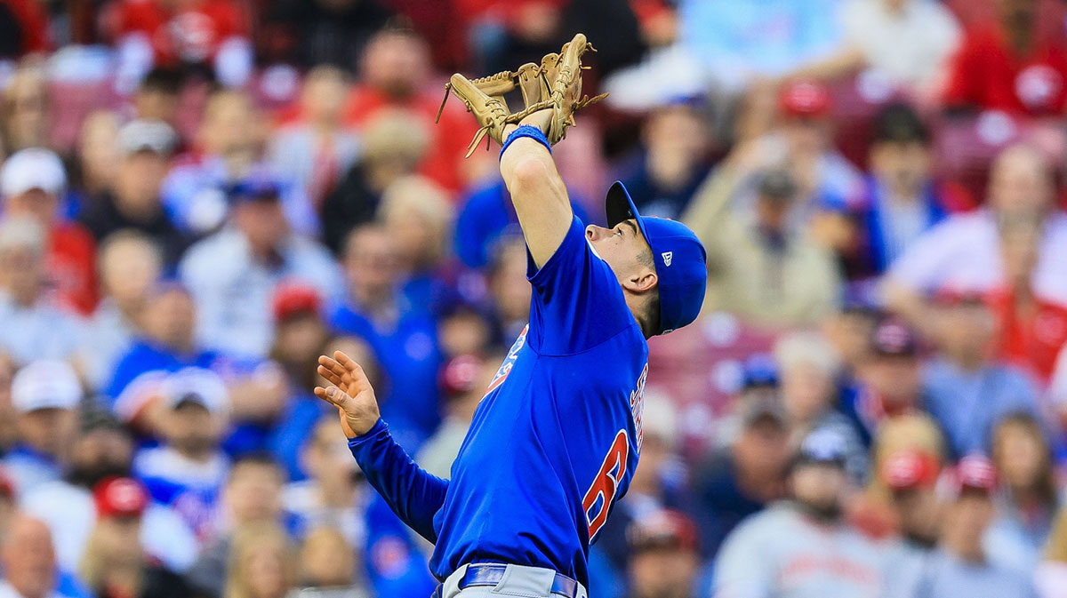 Chicago Cubs third baseman Matt Shaw (6) catches a pop up hit by Cincinnati Reds catcher Jose Trevino (not pictured) in the first inning at Great American Ball Park.