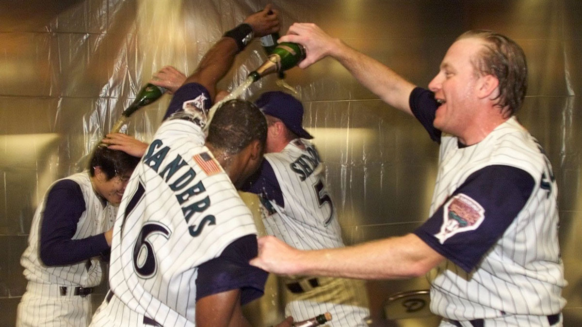 38415 - DBacks vs St. Louis - Arizona Diamondbacks #38 Curt Schilling celebratiing with team after the game inside the lockerroom against the St. Louis Cardinals inside of Bank One Ballpark in Phoenix, AZ