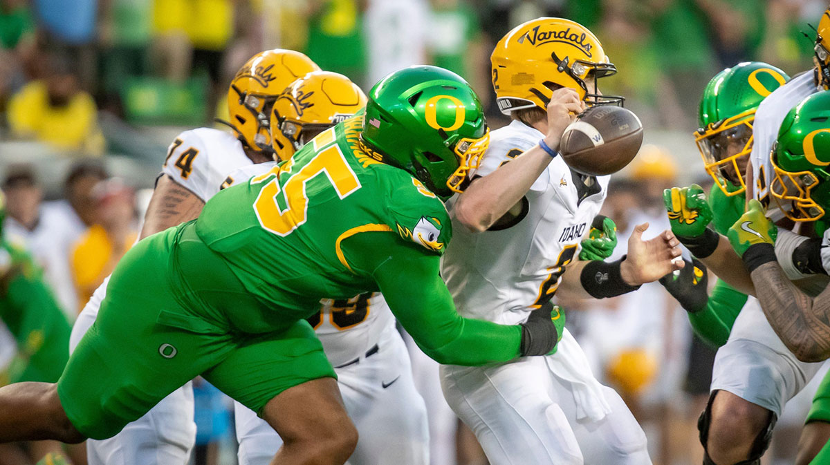 Oregon Ducks defensive lineman Derrick Harmon forces a fumble from Idaho Vandals quarterback Jack Layne as the Oregon Ducks host the Idaho Vandals Saturday, Aug. 31, 2024, at Autzen Stadium in Eugene, Ore.